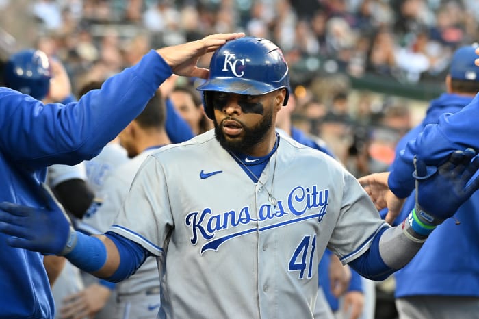 Sep 25, 2021; Detroit, Michigan, USA; Kansas City Royals first baseman Carlos Santana celebrates his fifth inning home run in the dugout in at Comerica Park. Mandatory Credit: Dale Young-USA TODAY Sports